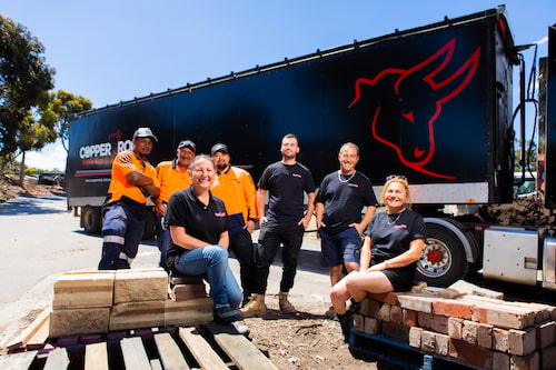 About CopperRock waste and recycling centre: image of CopperRock team members sitting in front of CopperRock truck